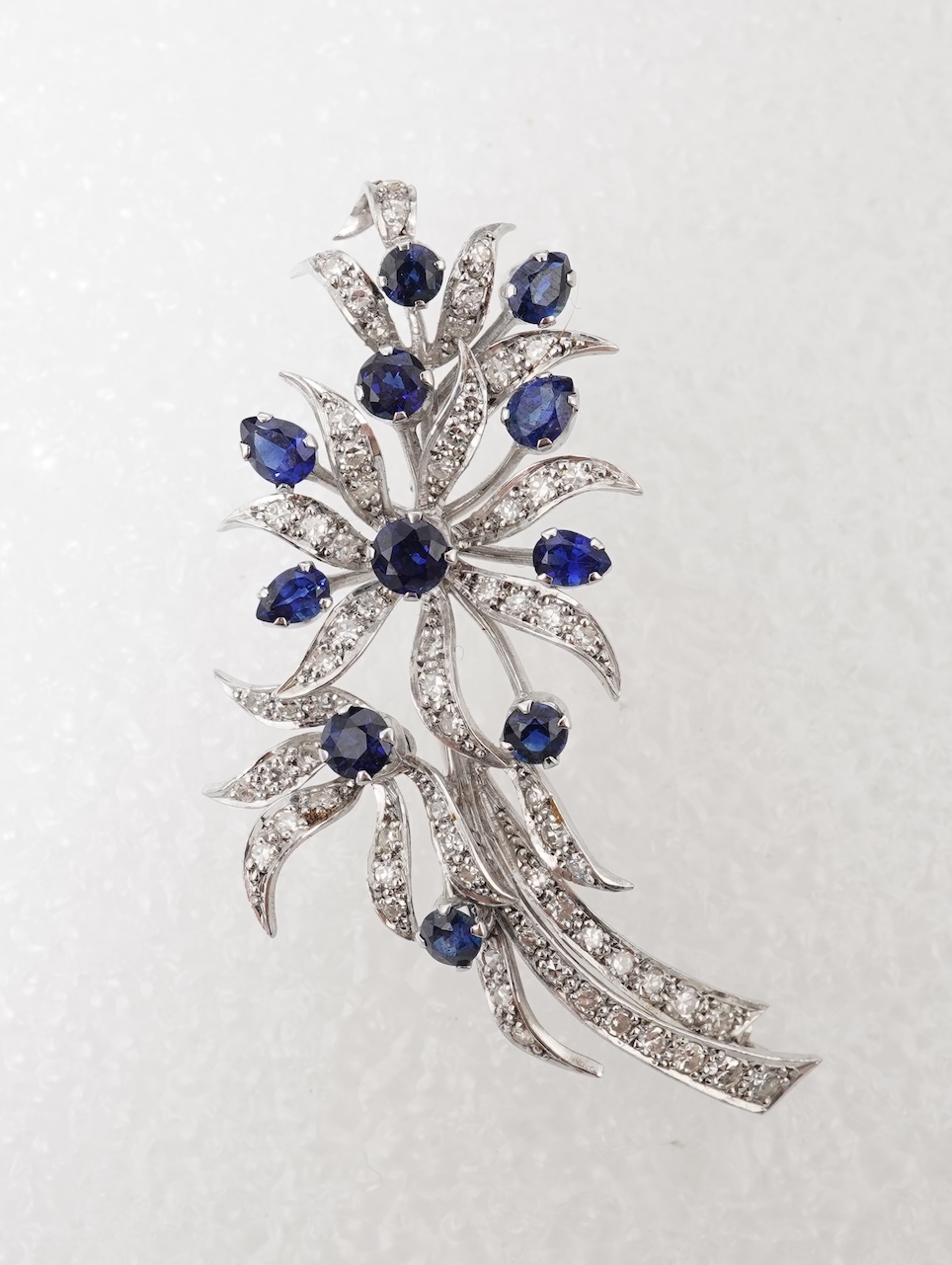 Cropp & Farr, a sapphire and diamond brooch, circa 1976